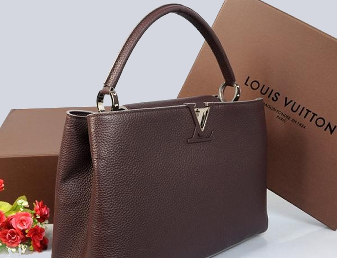 Louis Vuitton decides to luxe up purses and prices to lure deeper pockets