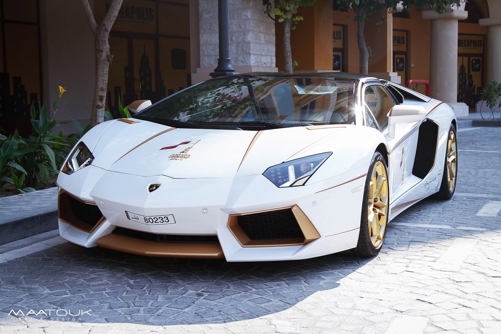 Meet the oneoff gold plated Lamborghini Aventador Roadster Qatar 