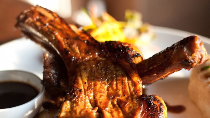 Chef Lloyd's famous grilled pork chops come with a house special marinade and BBQ sauce.