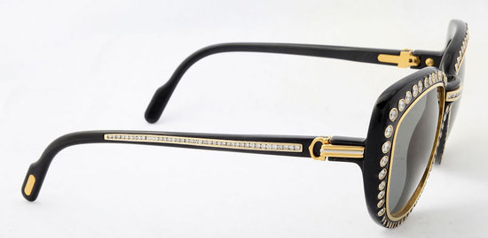 LOT:929 | CARTIER - a pair of Santos de Cartier sunglasses.