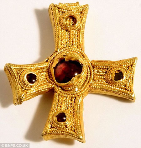 Treasure hunter finds cross worth a whopping $50,000.