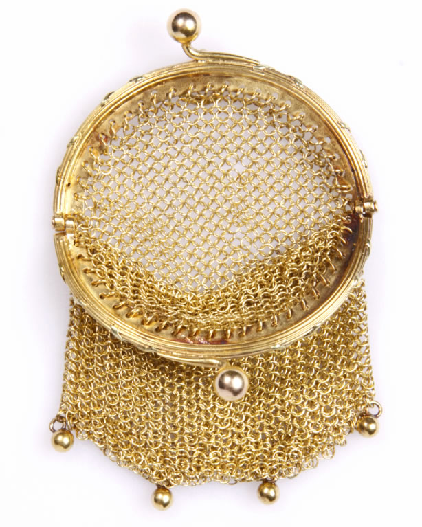 Solid gold change purse is a precious collectible