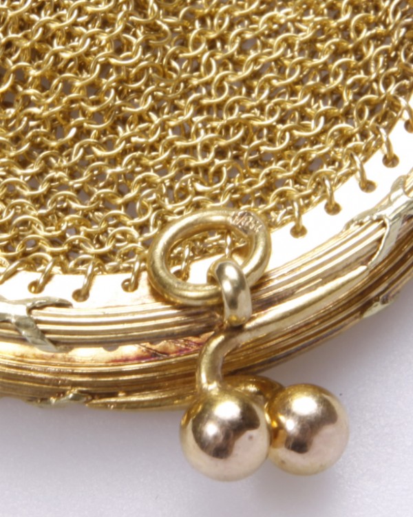 Solid gold change purse is a precious collectible
