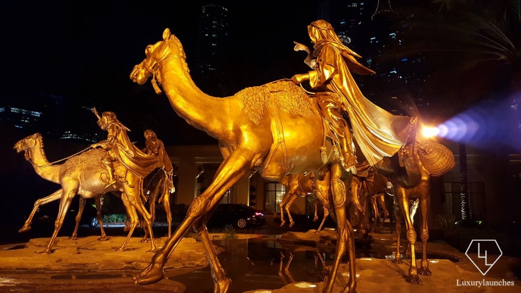 Seven golden nomads, mounted over seven golden horses symbolising seven Arab Emirates. The grand entrance of the Palace 