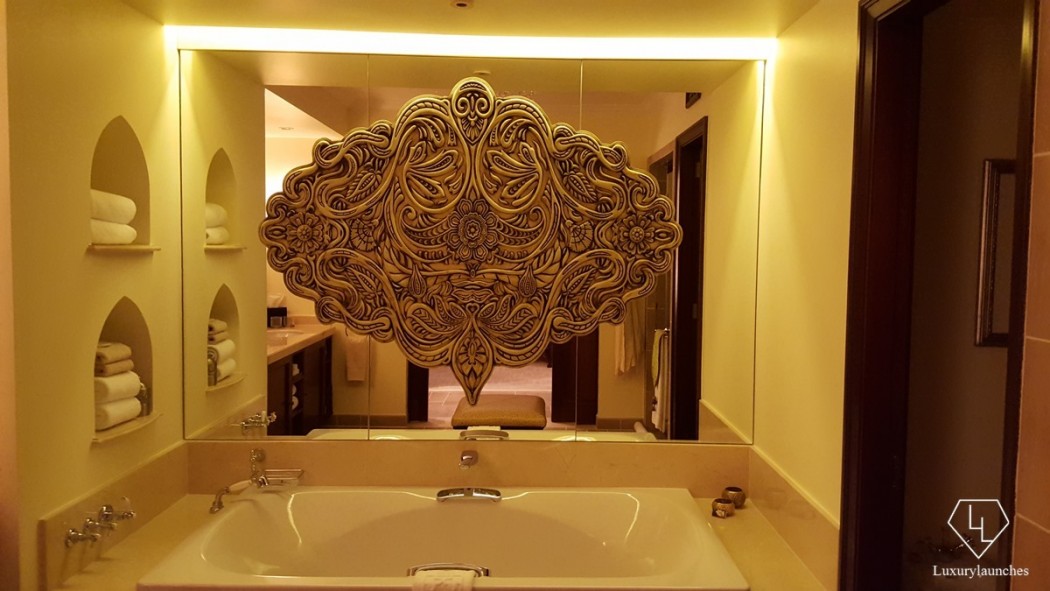 Ornate mirror in a bathroom in The Palace