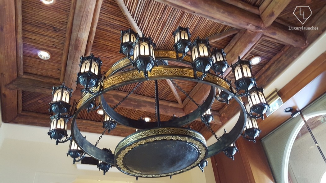Regal chandeliers gracing the ceilings