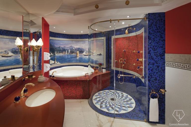 The luxurious bathroom in the Upper level features a mezzanine floor and a full size a full-size Jacuzzi and a separate five-head rain shower.