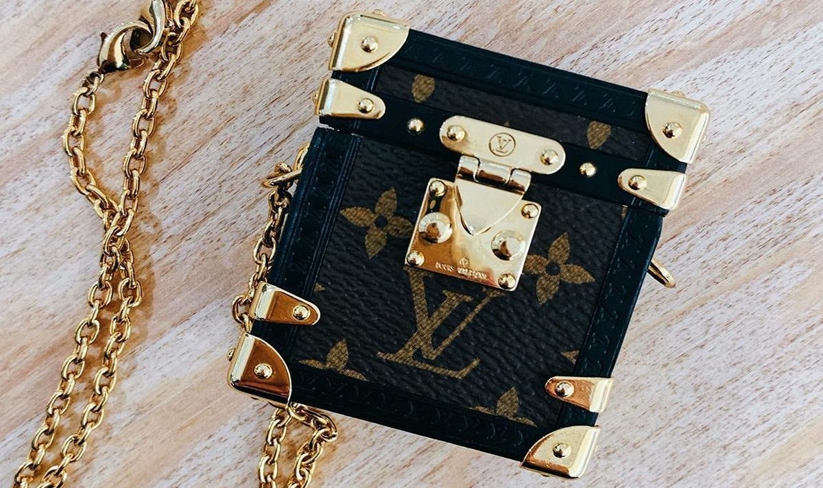 Shaped as a tiny monogrammed trunk Louis Vuitton has unveiled the classiest case for your Apple ...