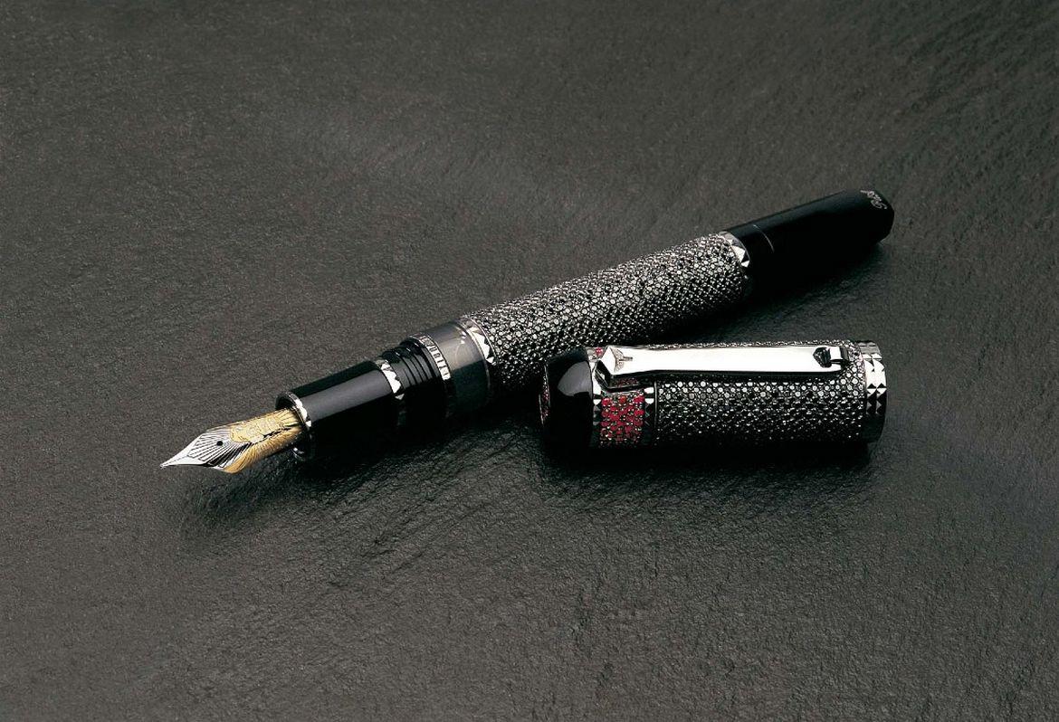 Take a look at the worlds most expensive pen - It costs $8 million and is  studded with black diamonds and rubies - Luxurylaunches