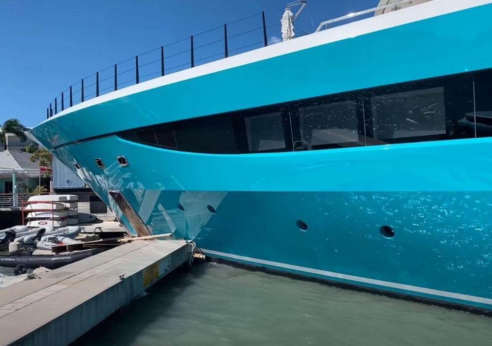 mega yacht crashes into dock