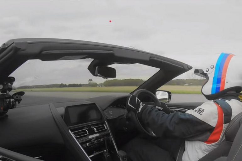 Video - A Pro golfer perfectly lands a golf ball into a moving BMW M8  Convertible 909 feet away to create a new Guinness World record -  Luxurylaunches
