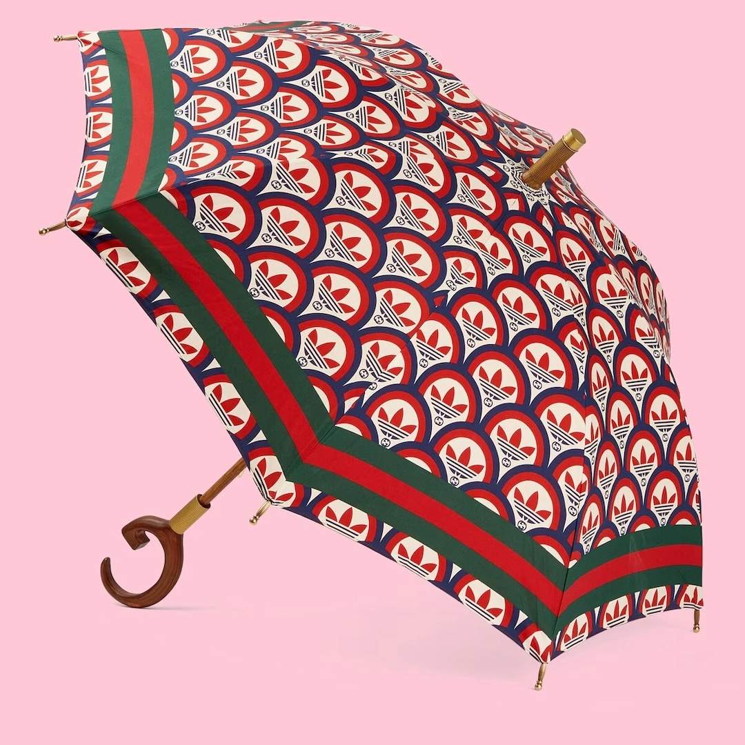 This gorgeous Adidas x Gucci umbrella costs $1300 and it won't protect you  from the rains. But you will look fashionable when soaking wet, guaranteed  - Luxurylaunches