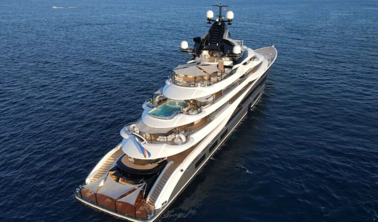 who owns super yacht sherakhan