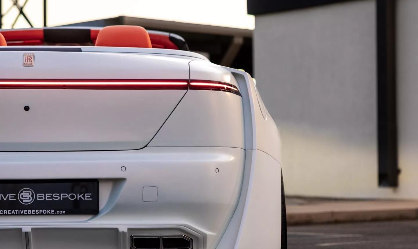 Tacky even for a crypto bro - This Dubai tuner has turned the Rolls-Royce  Dawn into a 25-car science experiment, swapping chrome for a 3D-printed  white grille and ending with a LED