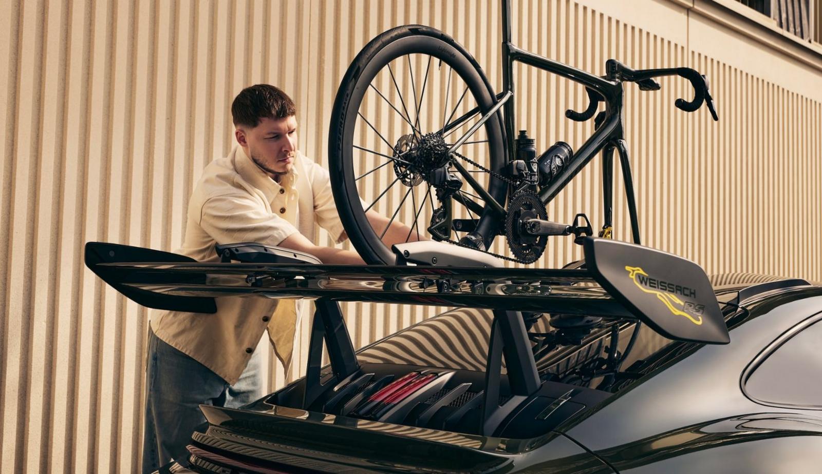 A Porsche 911 GT3 RS owner in Switzerland wanted his bicycle to match his supercar so badly that he recreated its exact colors, ceramic brakes, badges, and carbon fiber details on a 15-pound road bike - Luxurylaunches